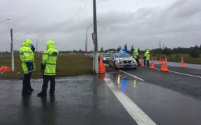 At a police checkpoint on SH1 south of Auckland, there are no queues at all coming into the region as it moves to alert level 3 on 15 January, 2021.