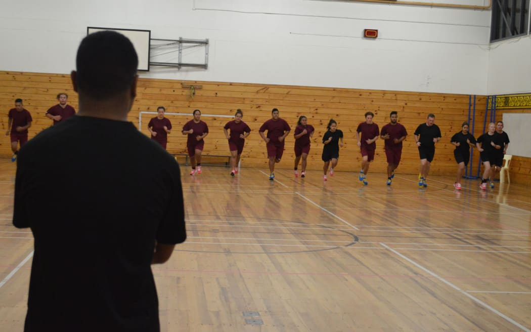 Porirua College students and their mentors do a beep test as part of the police initiative.