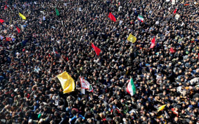 Iranian mourners gather during the final stage of funeral processions Qasem Soleimani, in his hometown Kerman.