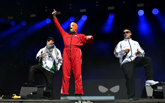 Irish rap band Kneecap perform at the West Holts stage on the fourth day of the Glastonbury festival at Worthy Farm in the village of Pilton in Somerset, south-west England, on June 28, 2025. (Photo by Oli SCARFF / AFP)