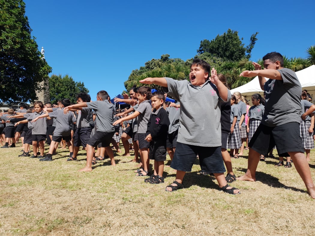 Students at Te Kura o Kokohuia perform a haka.