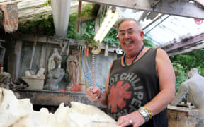 Mannequin maker Glen Wilkin-Holland says most stores don't want to include larger sizes in their displays.
