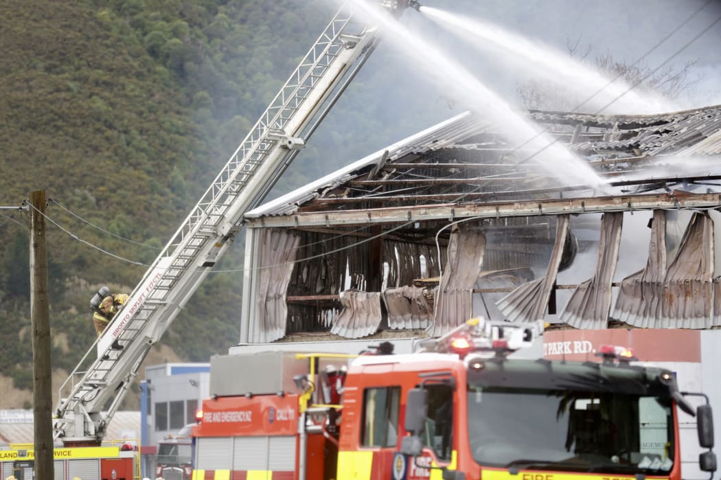 Firefighters tackling a large blaze in a commercial building in the Lower Hutt suburb of Gracefield.