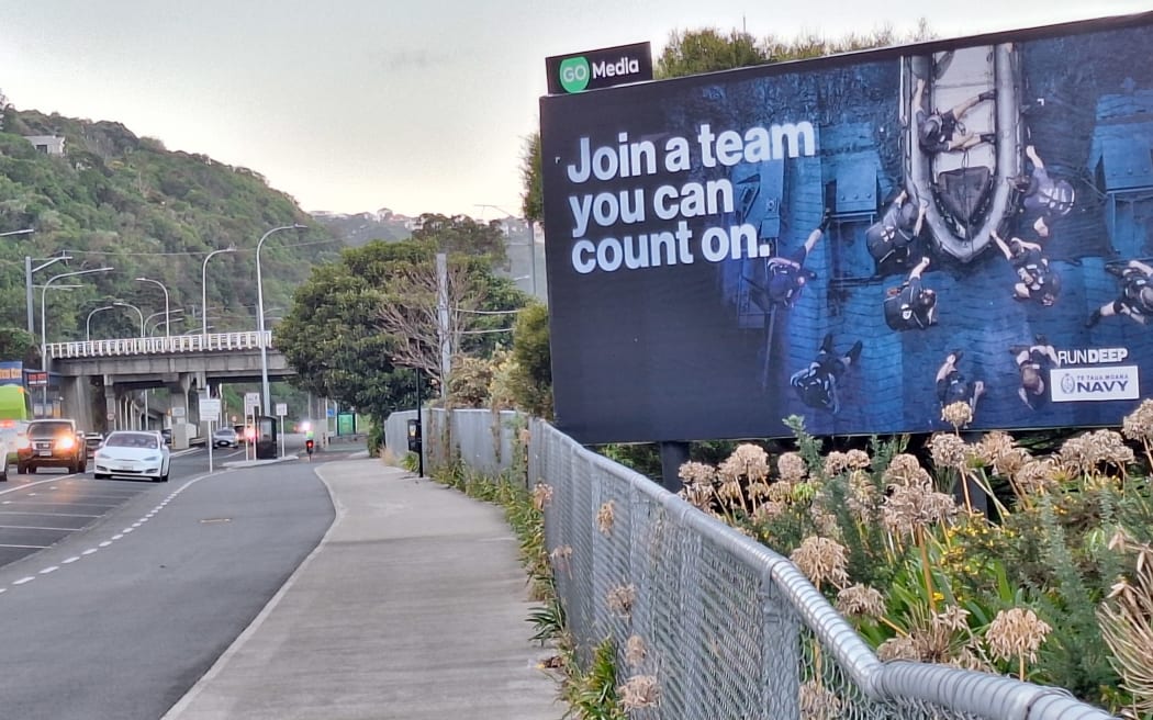 A NZDF navy recruiting poster on a Wellington road