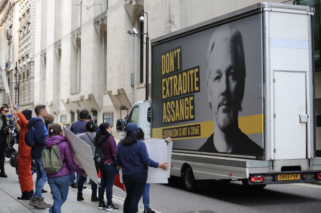 Supporters of WikiLeaks founder Julian Assange demonstrate outside the Central Criminal Court (Old Bailey) after Julian Assange appeared in court for a full extradition hearing on the last day of the trials in London, United Kingdom  Hasan Esen / Anadolu Agency