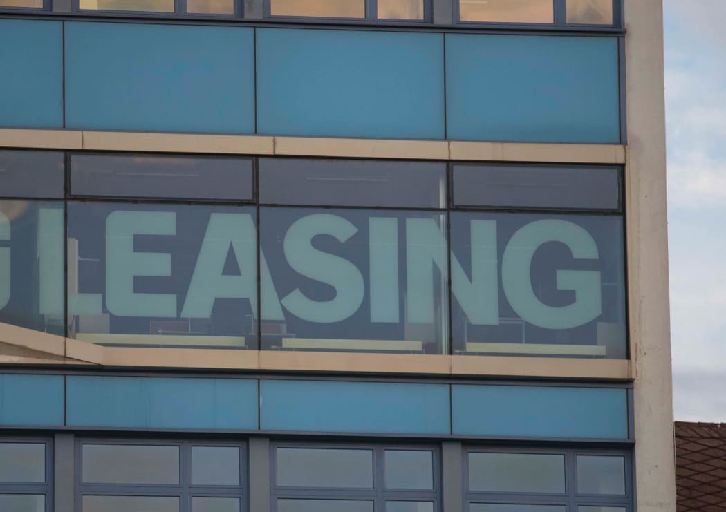 leasing sign on a building