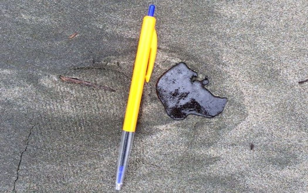 A clump of oil on Foxton Beach - 15 June 2015.