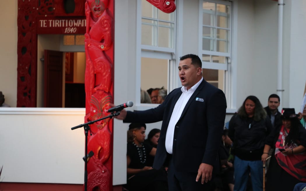 Penetaui Kleskovic, Far North councilor and General Manager for Te Aupouri, delivers his whaikōrero during dawn ceremony at re opening of te whare tūpuna at Waitangi 2025.