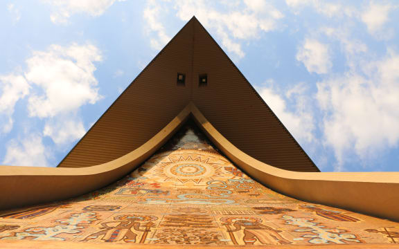 Intricate artwork displayed on the facade of the Papua New Guinea parliament building in Port Moresby.