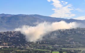 Smoke rises above the southern Lebanese border village of Khiam following Israeli bombardment on January 6, 2024, amid ongoing battles between Israel and Palestinian Hamas militants in the Gaza Strip.