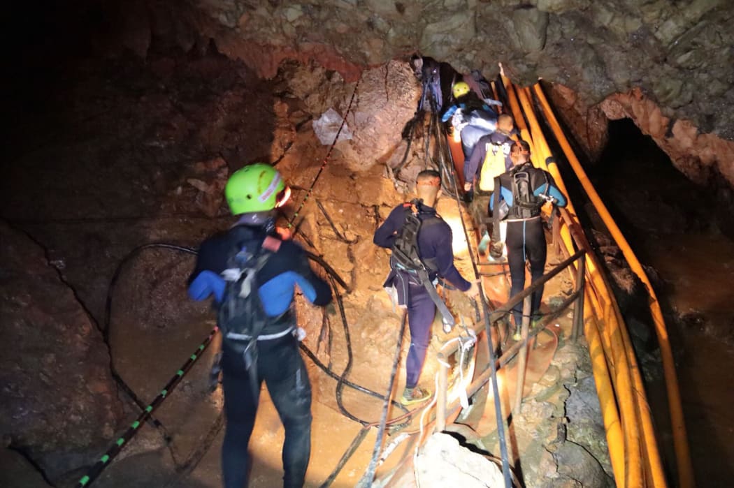 Thai Navy divers in Tham Luang cave during the early stages of the rescue operation.