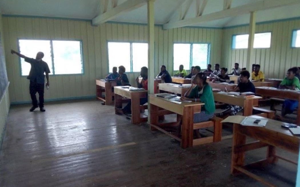 A chemistry lesson at Awaba Secondary School.