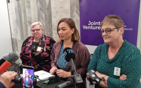 National Network of Family Violence Services chief executive Merran Lawler, Minister for the Prevention of Family Violence Marama Davidson, and Women's Refuge chief executive Dr Ang Jury.