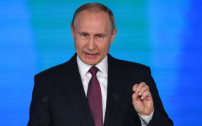 Russian President Vladimir Putin addresses the Federal Assembly.