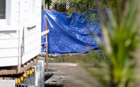 Police remained at the scene at 3 Marlborough Street yesterday.