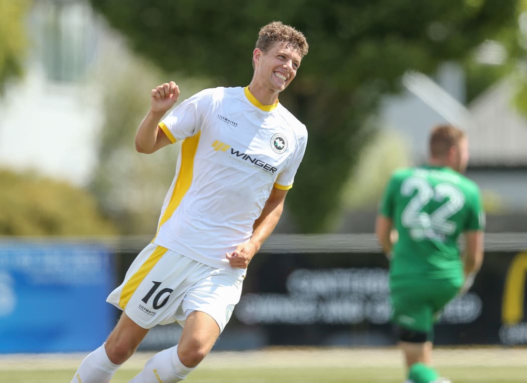 Reid Drake celebrates scoring a goal for Eastern Suburbs against Canterbury United.