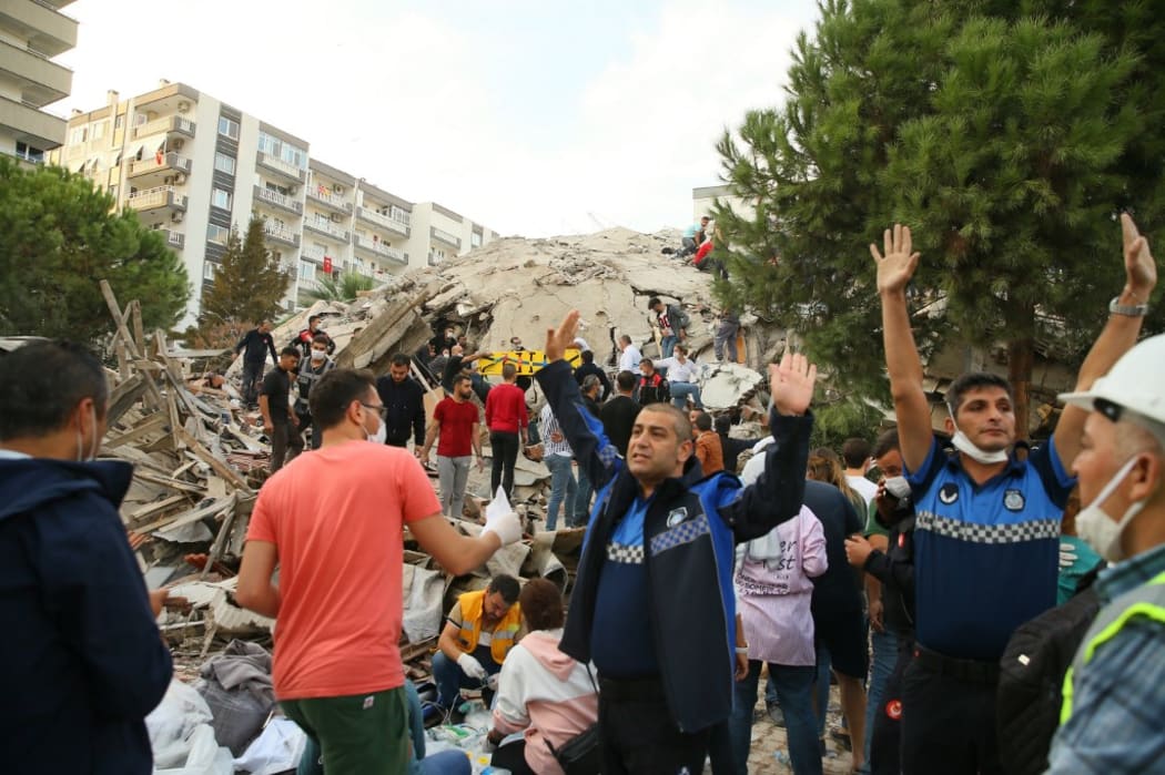 IZMIR, TURKEY - OCTOBER 30: Search and rescue works are being conducted at debris of a building in Bayrakli district after a magnitude 6.6 quake shook Turkey's Aegean Sea coast, in Izmir, Turkey on October 30, 2020.