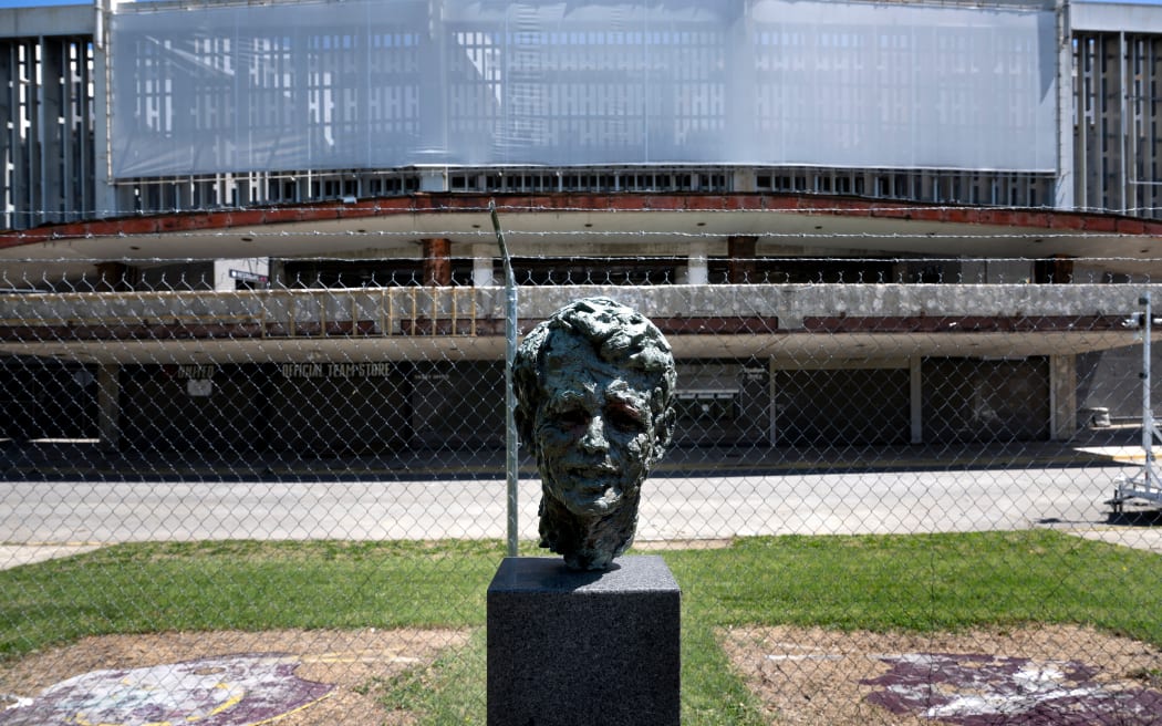 A bust of Robert F. Kennedy Jr. stands outside RFK Stadium, defunct and currently under demolition, in Washington, DC, on April 28, 2025. The Washington Commanders NFL (National Football League) franchise and the city of Washington, DC, have announced an agreement to build a new stadium at the site where the team formerly played from 1961 to 1996. The team currently plays at Northwest Stadium in Landover, Maryland. (Photo by Brendan Smialowski / AFP)