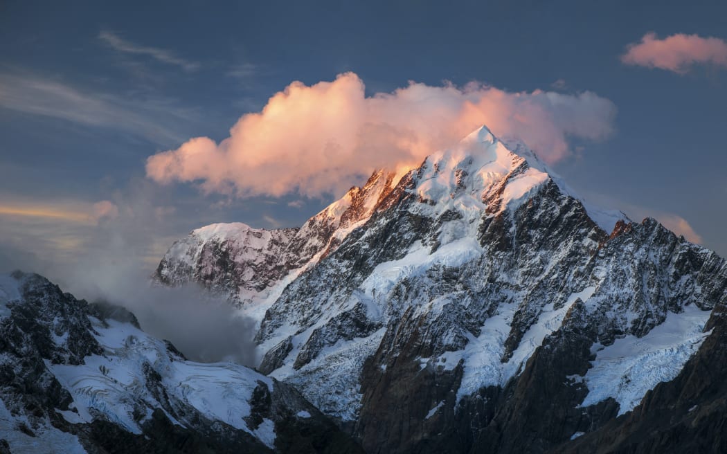 Mt Cook peak with cloud in the last evening light, Mt Cook National Park, Canterbury, New Zealand (Photo by Florian Brill / mauritius images via AFP)