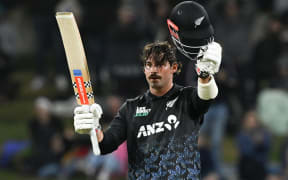 New Zealand’s Tim Robinson celebrates his century against Australia in the first game of the Chappell-Hadlee Trophy T20 cricket series at Bay Oval, Tauranga. 1 October 2025 © Photo: Andrew Cornaga / Photosport
