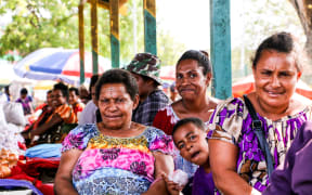 Women in PNG at a market in Port Moresby
