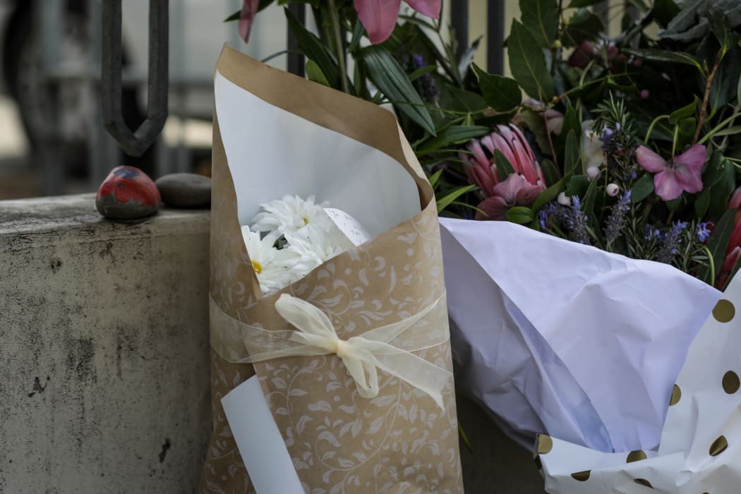 Flowers left at the first Friday prayers after the mosque shooter's sentencing.
