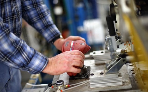 A worker at a sporting goods factory in Ohio.
