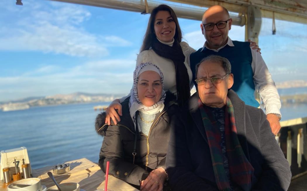 Hala Albakour, top left, with her husband and parents.