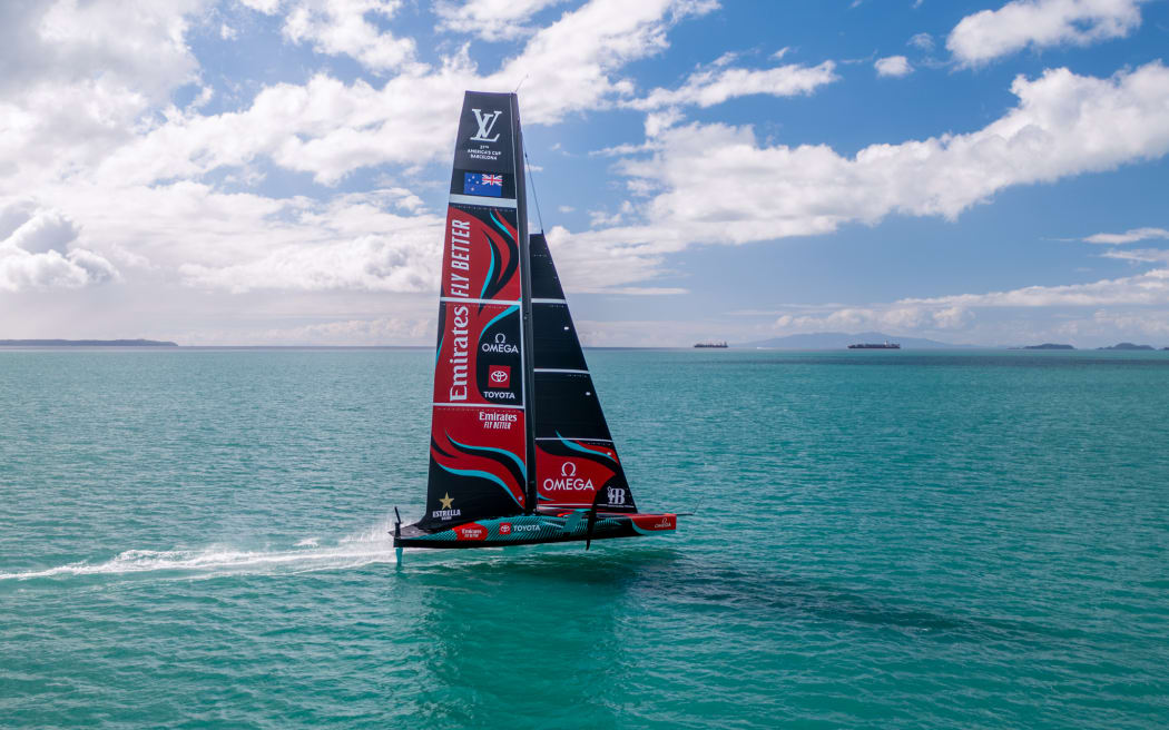 After three years of design, innovation and build work Team New Zealand have launched Taihoro, the boat they will sail in their defence of the 37th America's Cup. Name of boat embargoed until 5pm, 18 April.
Emirates Team New Zealand’s new AC75 sailing on Auckland’s Hauraki Gulf.