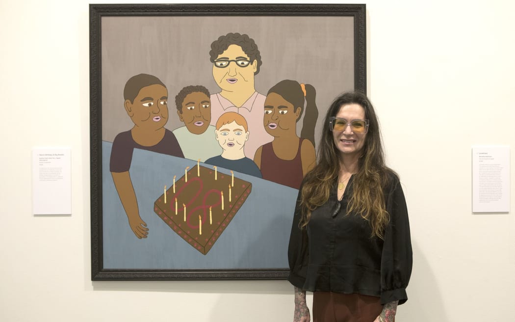 Judge Fiona Partington with the winning artwork 'Nana's Birthday'.
