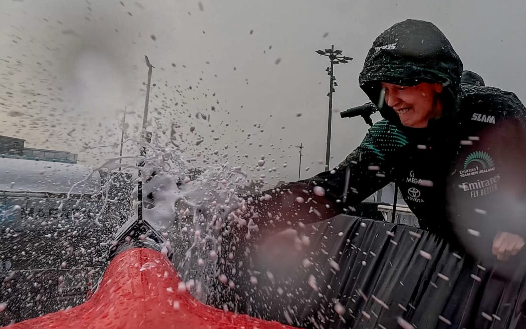 Former prime minister Helen Clark christens Team New Zealand's AC75 Taihoro