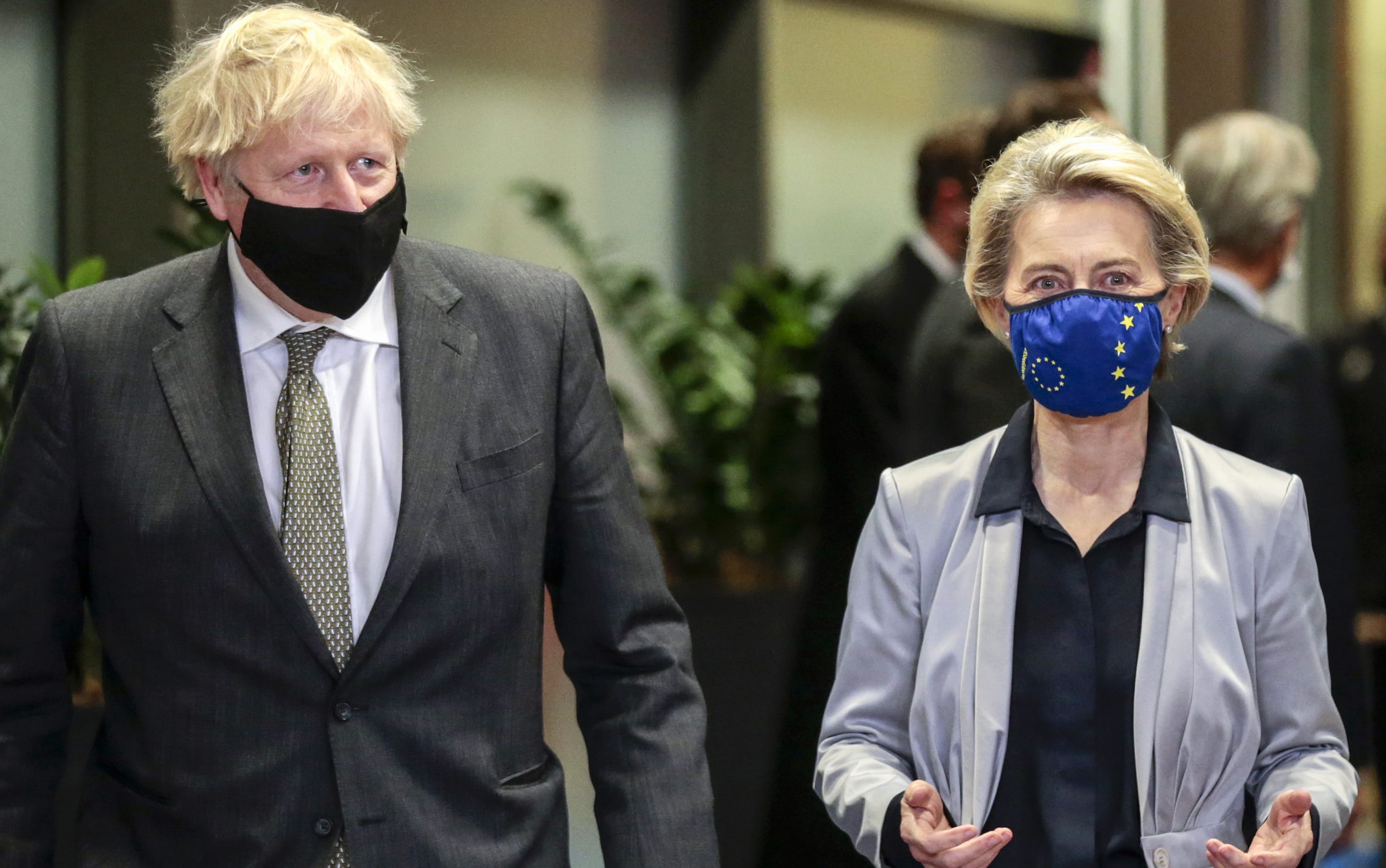 Britain's Prime Minister Boris Johnson is welcomed by European Commission President Ursula von der Leyen at the EU headquarters in Brussels.