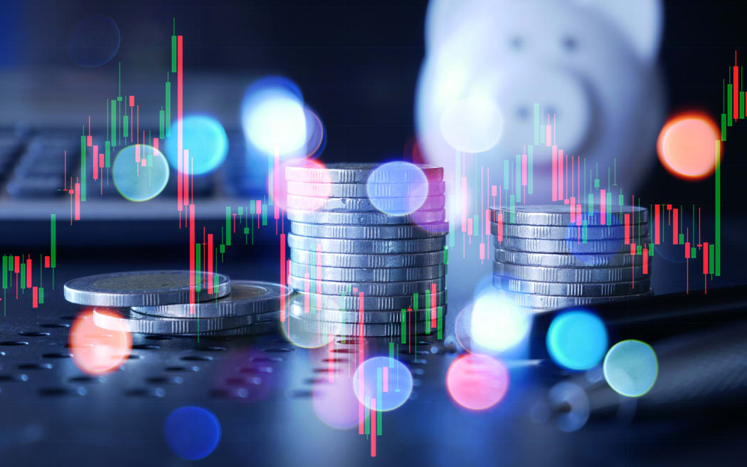 Generic graph and rows of coins for finance and business.