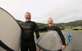 Out-of-town surfers Matt Boswell and Scott McGregor at Piha today.