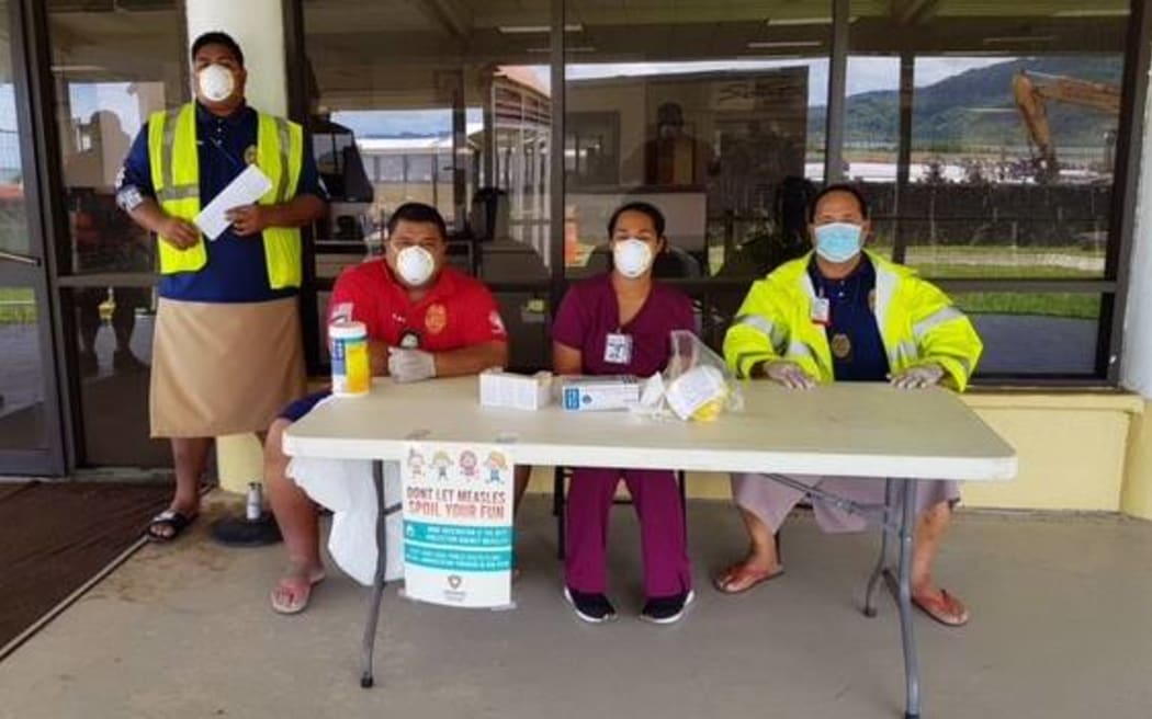 Measles screening at Pago Pago International Airport.
