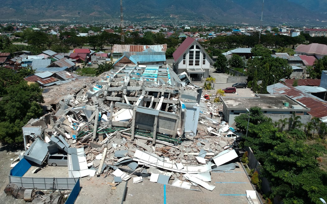 This aerial picture shows the remains of a ten-storey hotel in Palu in Indonesia's Central Sulawesi.