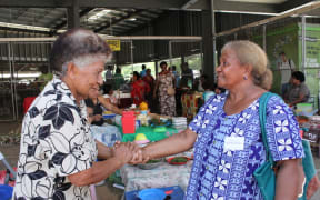 Vanuatu’s Luganville Municipal Council representative, Catherine Leo, meets Nadi Market Vendor Association President, Lia Lawanamate during the field visit to Nadi Market.18 Nov 2016