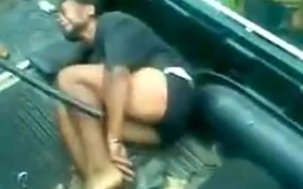 Video footage of a man allegedly being beaten by Fiji security personnel in 2012.
