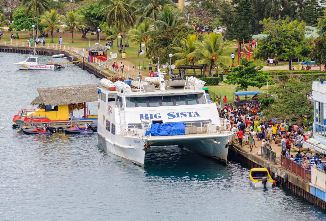 Big Sista, a 33m passenger vessel, has arrived on its weekly run from Luganville Santo to the harbour in front of the main market of Port Vila - Efate Island, Vanuatu, 21 September 2012