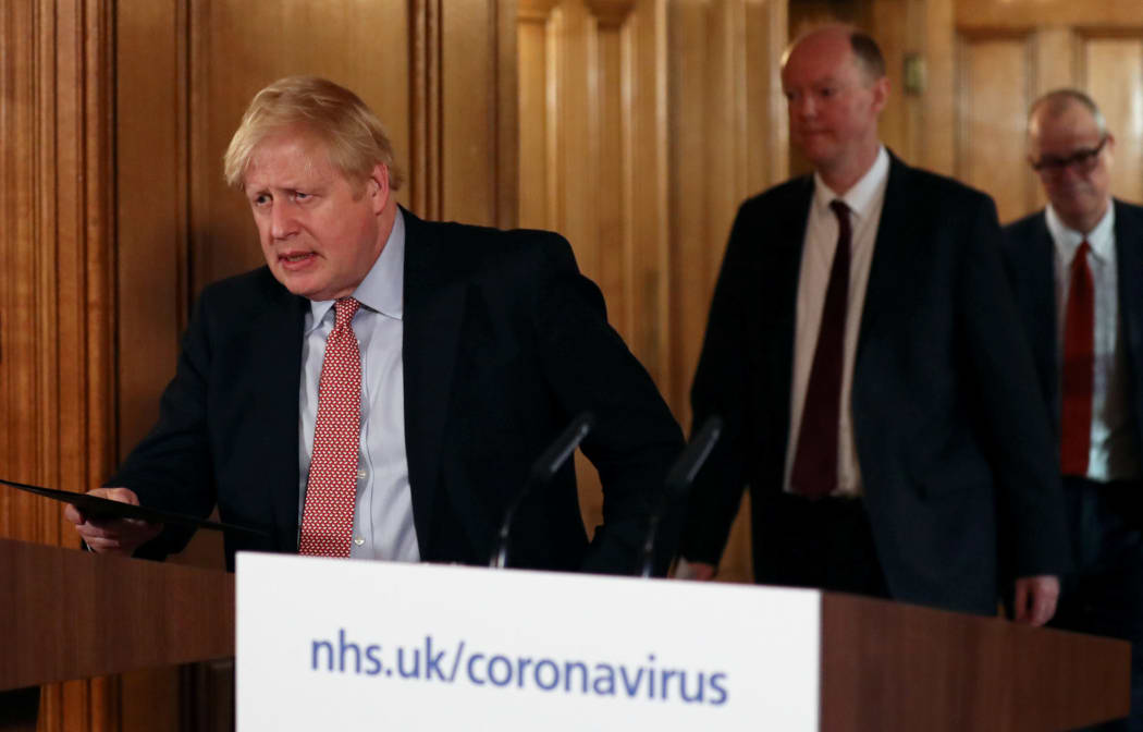 Britain's Prime Minister Boris Johnson  arrives at a news conference addressing the government's response to the novel coronavirus COVID-19 outbreak, at 10 Downing Street.