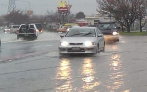 Traffic slowed as surface flooding increased in Rangiora.