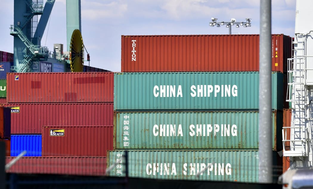 Containers are stacked on a vessel at the Port of Long Beach in Long Beach, California on July 6, 2018, including some from China Shipping, a conglomerate under the direct administration of China's State Council.