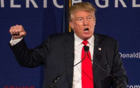 Republican presidential candidate Donald Trump speaks at a Pearl Harbor Day Rally at the USS. Yorktown December 7, 2015 in Mt. Pleasant, South Carolina.