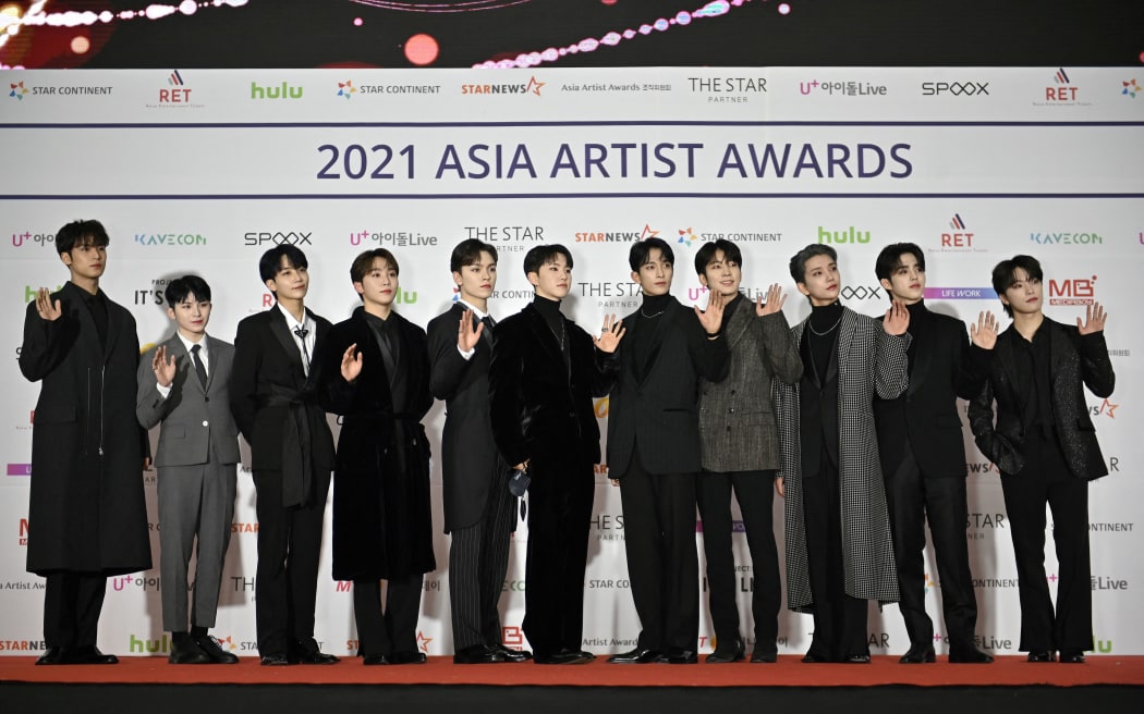 South Korean boy band 'Seventeen' pose on the red carpet of the '2021 Asia Artist Awards' in Seoul on December 2, 2021.