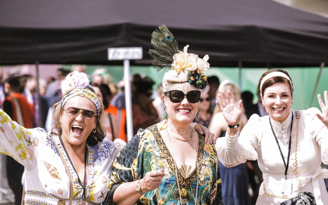 Crowds excited for New Zealand Trotting Cup at Addington Raceway in Christchurch.