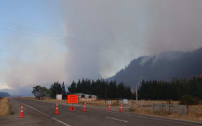 Northbank Road near the fire is closed.