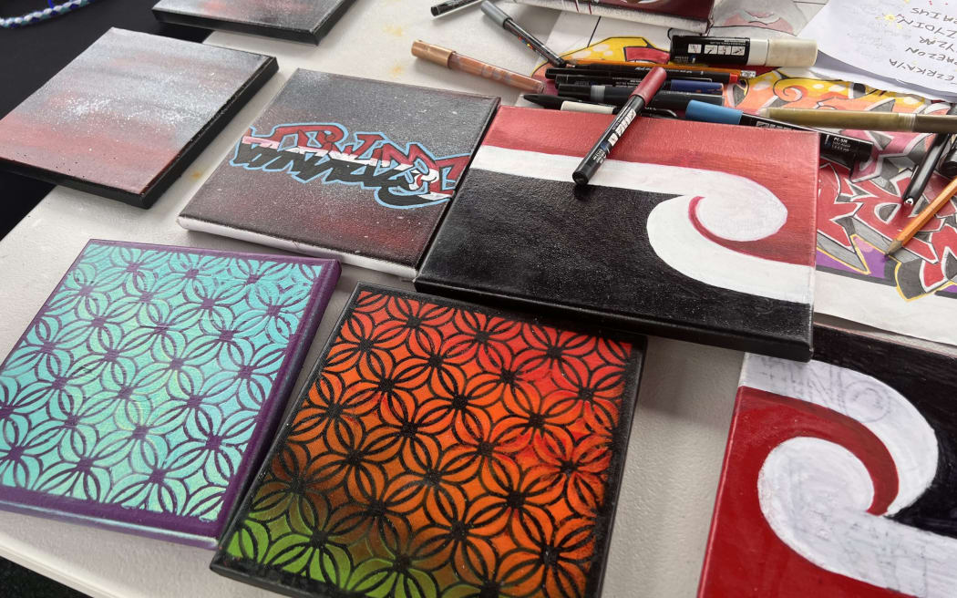 Loko Arts creating canvas art for sale.