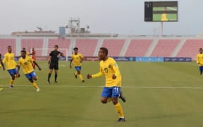 Alwin Hou celebrates a goal against Papua New Guinea.