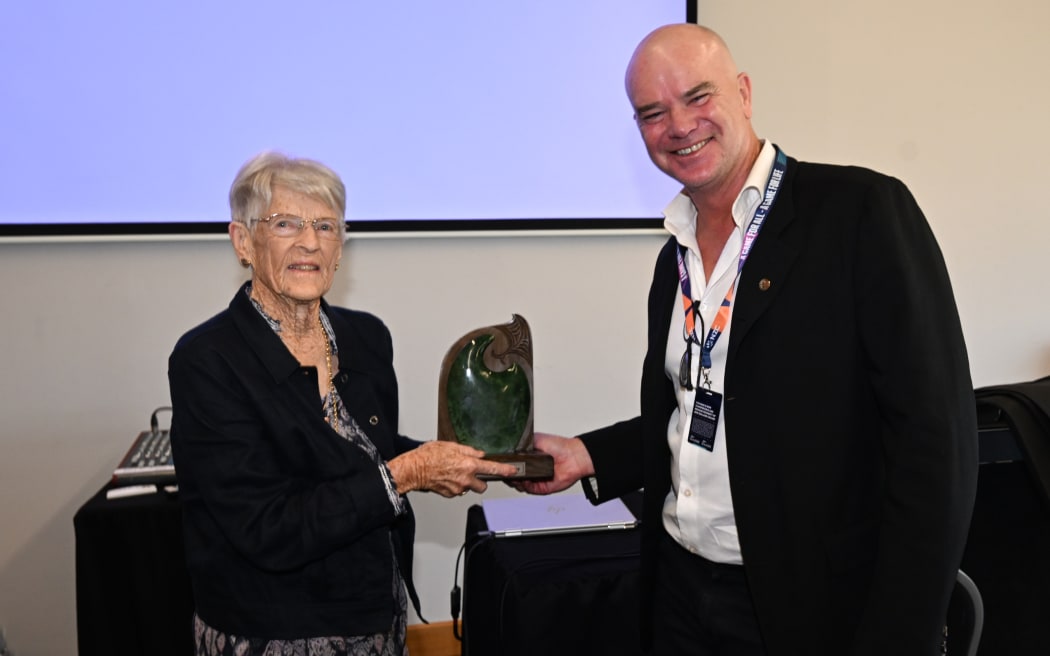 Dion Nash and Shiela, Lady Graham, at the unveiling of a trophy and annual scholarship named in the late Sir John Graham's honour during the test match between New Zealand and England at Wellington's Basin Reserve.