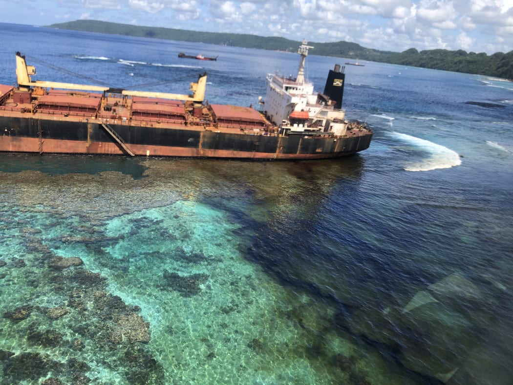 The MV Solomon Trader stuck on a reef off of Rennell Island in the Solomon Islands is leaking oil into the ocean. February 2019.